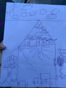 Child's drawing of new home